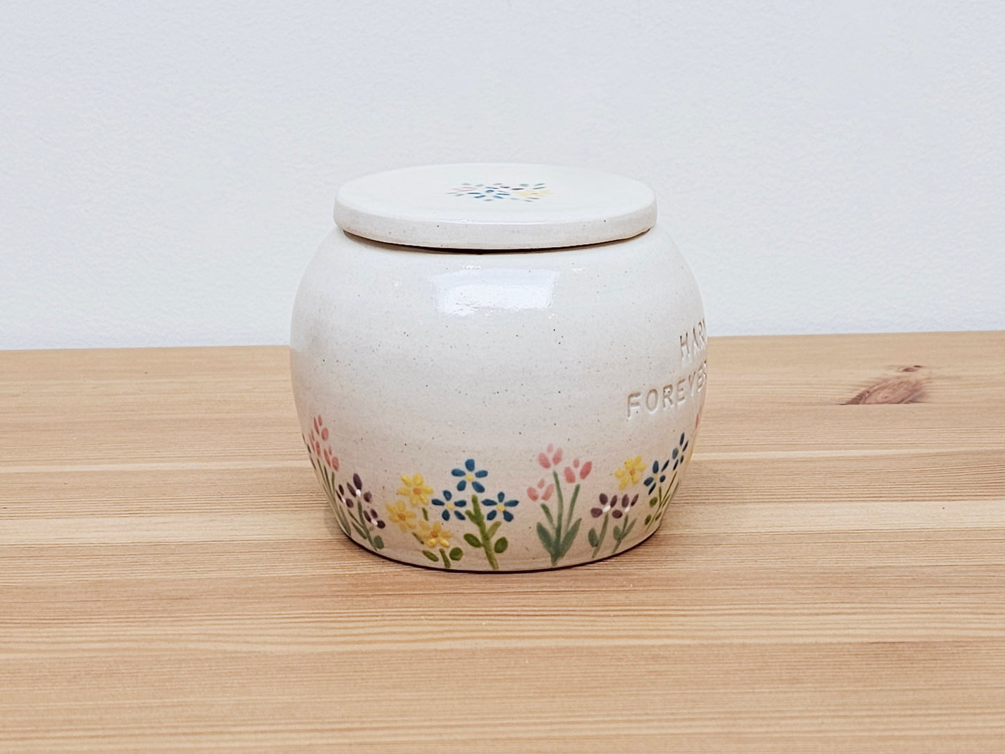 Personalised handmade ceramic pet urn with floral Garden Blossom design – custom memorial urn for dog, cat, or small pet ashes.