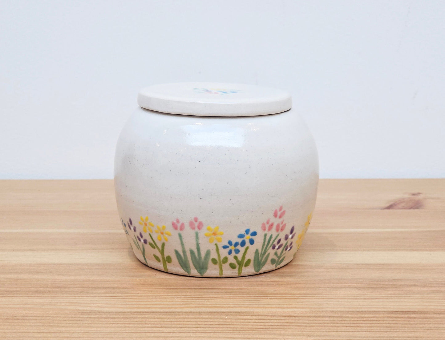 Personalised handmade ceramic pet urn with floral Garden Blossom design – custom memorial urn for dog, cat, or small pet ashes.