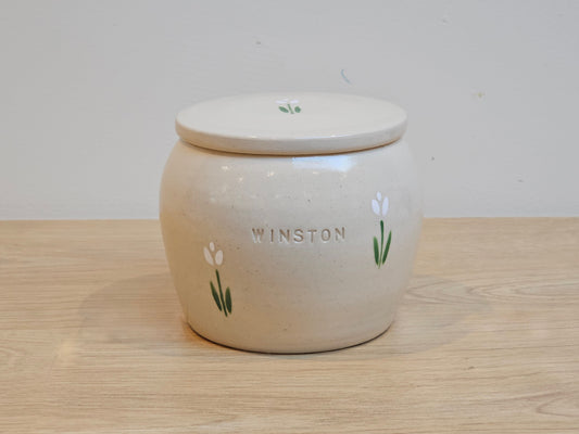Dog urn with white tulips and words Winston inscribed